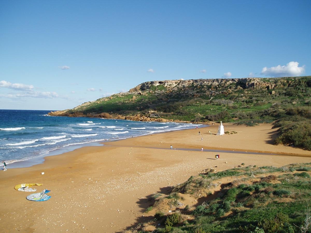The red sand of Ramla Bay seen from the hills above
